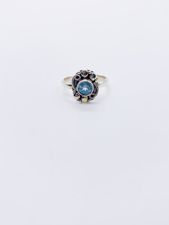 BLUE TOPAZ SWIRL SHIELD RING